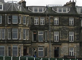 The clubhouses of The St Rule Club (left) and St Andrews Golf Club (right)