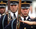 A U.S. Army Drill Team member executing precision drill movements during a festival in Fort Eustis, Virginia.