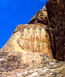 Rock carvings of people