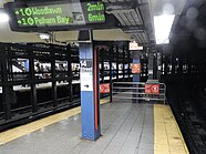 View of the northern end of the northbound platform. The northern end of the southbound platform, which extends beyond the northbound platform, is visible to the left.