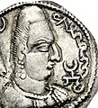 Khingila with the word "Alchono" in Bactrian script (αλχονο) and the Tamgha symbol on his coins.[155][156]