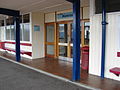 Entrance to foyer and ticket office, and access to car park.