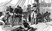 Slavers bringing captives on board a slave ship