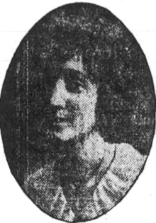 A young white woman with dark hair, in an oval frame