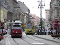 Trams in Miskolc; on the right a Hungarian product, on the left a second-hand car from Austria