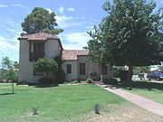 The C. J. (Blinky) Wilson House was built in 1929 and is located at 223 W. 10th St. It was listed in the National Register of Historic Places in 1985, reference #85000900.