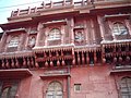 Ornate jharokha windows.