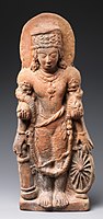 Vishnu holds the Kaumodaki in his lower right hand; 5th century.