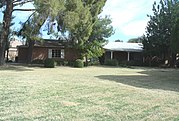 The Dea Hong Toy House was built in 1954 and is located at 2222 East Pasadena Avenue. Toy was born in China and moved to Phoenix in 1923. He was a successful merchant. Toy was among those in the Asian community of Phoenix who in 1938 founded the Chinese Chamber of Commerce to protect and promote their businesses. This property is recognized as historic by the Asian American Historic Property Survey.