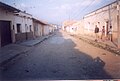 Streetscene. A neglected and unprepossessing exterior often hides a beautiful garden within.