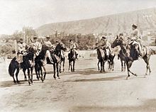 Several men on horseback