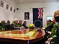 New Zealand Governor General and members of the Cook Islands cabinet wear lei at a meeting.