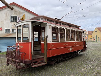 One of the few surviving Lisbon's São Luís type cars (series 400–474): of the original batch of 75 units, imported in 1901 and retired up to 1973, most were scrapped, three remain operational in Lisbon (a museum car restored to original condition and two modified for tourist duty since 1965, fitted with luxury upholstering — No.2, former No.435, on the photo), and five saw heritage use in Detroit in 1978–2003.
