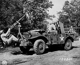WC-55 in a posed picture showing the M2 heavy machine gun for anti-aircraft use