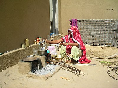 Parallel-woven charpai in Rajasthan, tipped up against the wall for the day