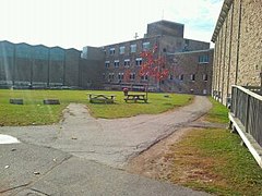 The old courtyard behind the school. The original building with the chapel and single gym, is visible.