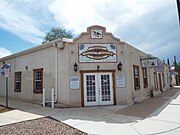 The William Herring Building. This building served as the home and office of William Herring, Wyatt Earp's lawyer in the 2nd trail of the O.K. Corral gun fight. In 1893, his daughter Sarah became the first woman to practice before the Arizona Supreme Court and, in 1913, she became the first woman ever to argue a case unassisted by male counsel before the United States Supreme Court. The building now houses the Tombstone Western Heritage Museum.