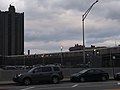 Tracey Towers with the train coming out of the parking lot, which houses Jerome Avenue.