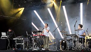 Leftfield performing live in 2016: L-R: Adam Wren, Neil Barnes, Nick Rice (from the band Hadouken!)
