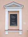 Plaque commemorating the victims of the Massacre of Praga