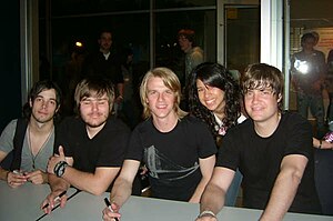 Left to right: David Crisp, Gordie Cochran, Jon Neufeld, fan, Tim Neufeld