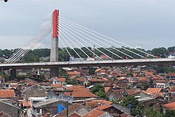 The Pasupati Bridge on top of resident houses.