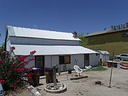 The Adrian Pierson House was built in 1912 and is located in E. 6th St. and U.S. Route 79. It was listed in the National Register of Historic Places in 1987; reference#87001593.