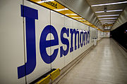 A platform at Jesmond, branded in the original corporate colour scheme.