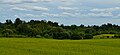 Lomeikiškiai hillfort covered by trees