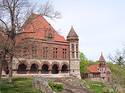 Oakes Ames Memorial Hall with Ames Free Library in background.