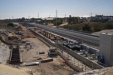 View from a bridge of the station platform's concrete foundations