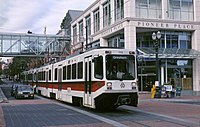 MAX train on Yamhill St with Pioneer Place (1991) - Portland, Oregon