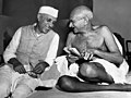 Jawaharlal Nehru sharing a joke with Mahatma Gandhi, Mumbai, 6 July 1946