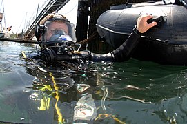 Military diver with full face mask with through-water comms.