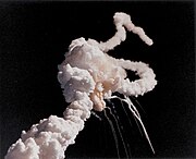 Smoke and debris from the Space Shuttle Challenger is seen after the disintegration in 1986.