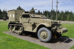 A picture of the M15 half-track displayed in a grassy area in Washington State