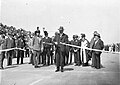 Image 27Ribbon ceremony to open the Sydney Harbour Bridge on 20 March 1932. Breaking protocol, the soon to be dismissed Premier Jack Lang cuts the ribbon while Governor Philip Game looks on. (from History of New South Wales)