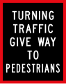 Turning traffic give way to pedestrians