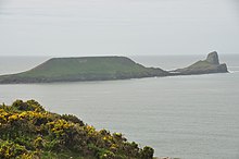 Worm's Head, viewed from above Rhossili Bay Beach.