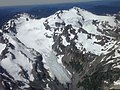 Aerial view of Athena in upper left at top of Hoh Glacier. Mt. Olympus to the right.