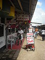 Image 28Butcher in the Central Market in Paramaribo with signs written in Dutch (from Suriname)