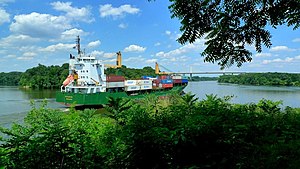 The container ship Reykjafoss on the Dutch Gap Canal heading downstream from Richmond towards Hampton Roads.