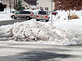 2 A large amount of snow moved off of a road by snow plow in Northern Virginia