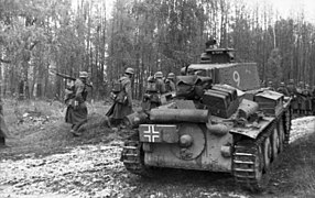 Panzer 38(t) tank with an armored N.K.A.V. mounted below the muffler and painted with a Balkenkreuz.