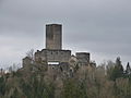 great hall, residential buildings and outbuildings to the east below the keep