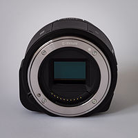 Sony Alpha ILCE-QX1 APS-C-frame camera without body cap from front
