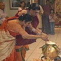 This is Aiya and Amma doing Puja