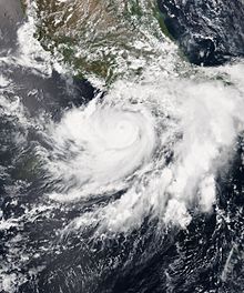Satellite image of small but well-defined Hurricane Carlos south of Mexico on June 13