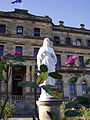 Statue of the Sacred Heart in Rose Garden; Main Building
