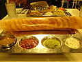 Dosa served with sambar and chutney